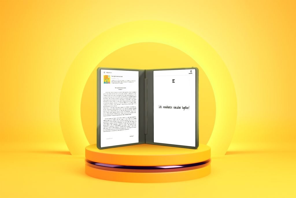 Close-up of the READTYCH Digital Book showing a textbook page on one screen and handwritten notes on the other